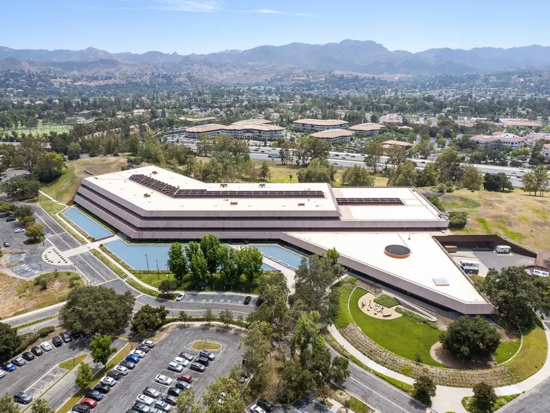 Aerial view of the One Westlake campus and surrounding hills